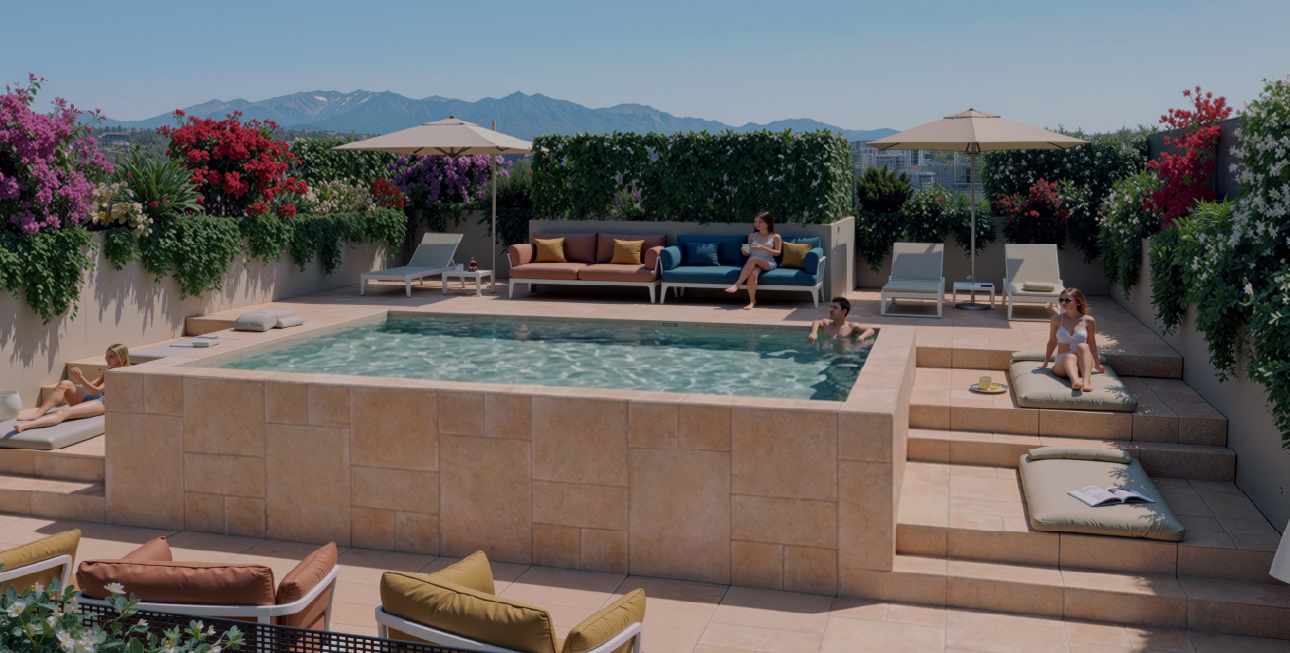 The rooftop: a raised stone pool, two parasols, sofas and loungers, bougainvillea along the walls, mountains behind.